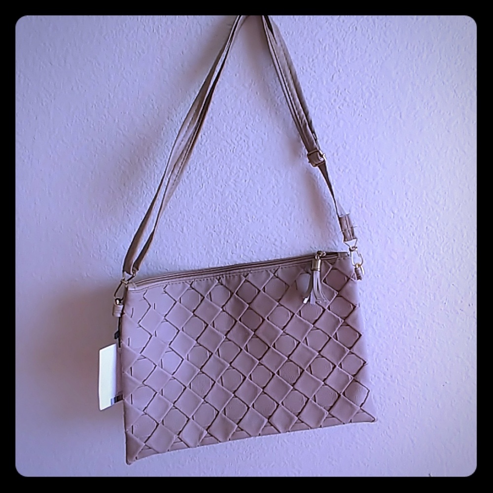 Small adjustable strap purse/clutch